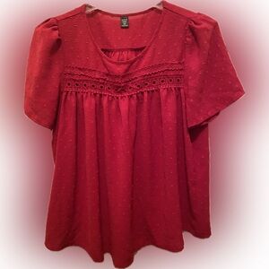 Red flowy blouse. Perfect for holidays or save for Valentine’s Day.